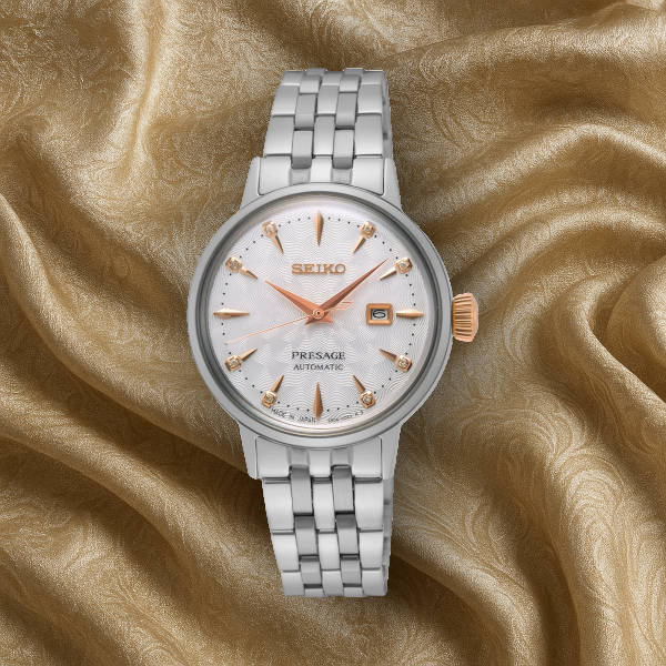 Seiko Presage women’s dress watch – mechanical model with enamel dial and crystal accents offering luxury at accessible price.